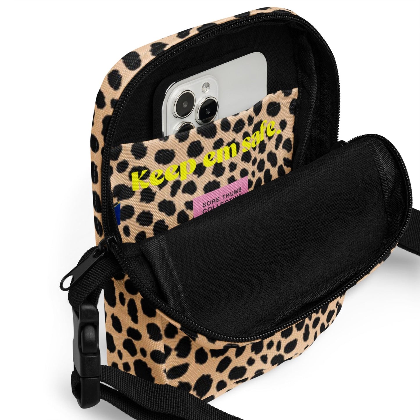 inside view of leopard print crossbody bag, with large main space and inside pocket
