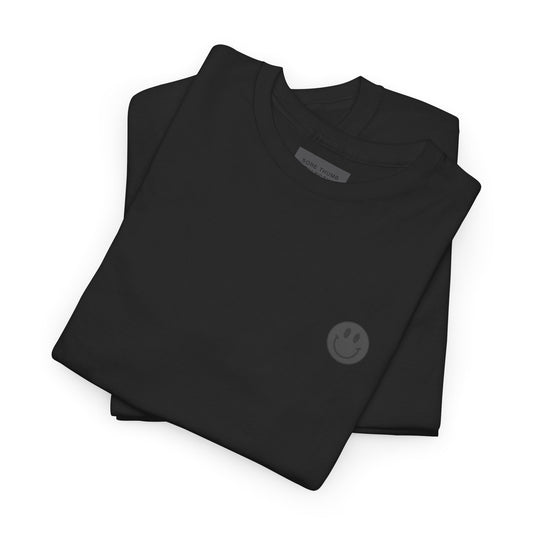 Folded black long-sleeve shirt with a smiley face logo on a white background