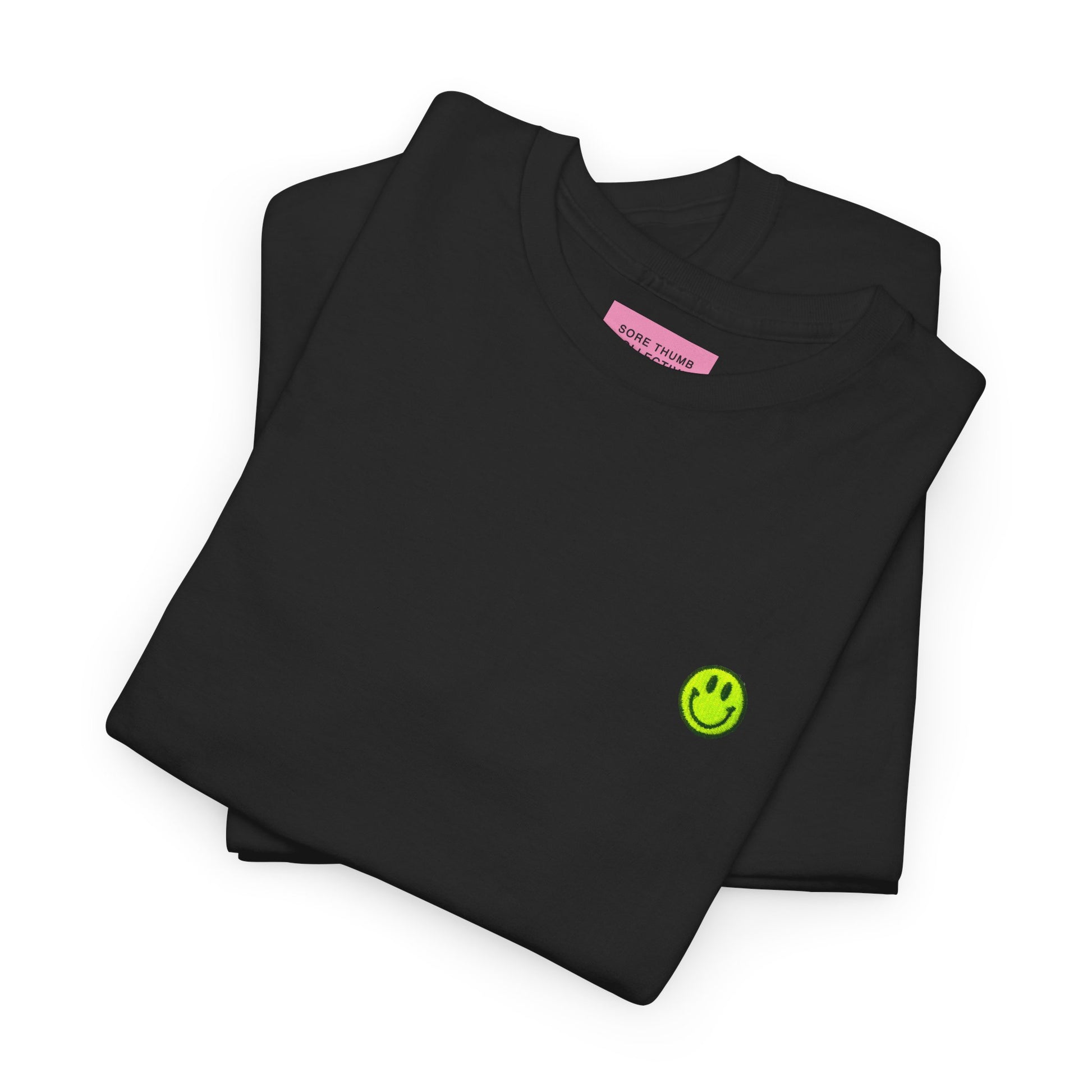 Folded black smiley face t shirt with neon yellow embroidery, 90s rave inspired