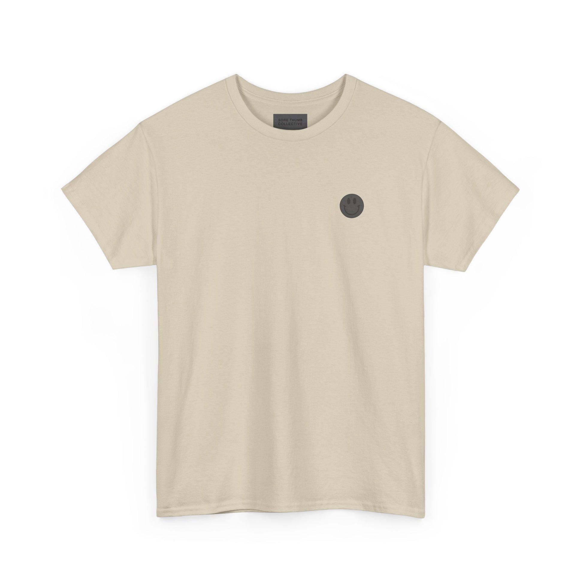 Beige t-shirt with a small black logo on a white background