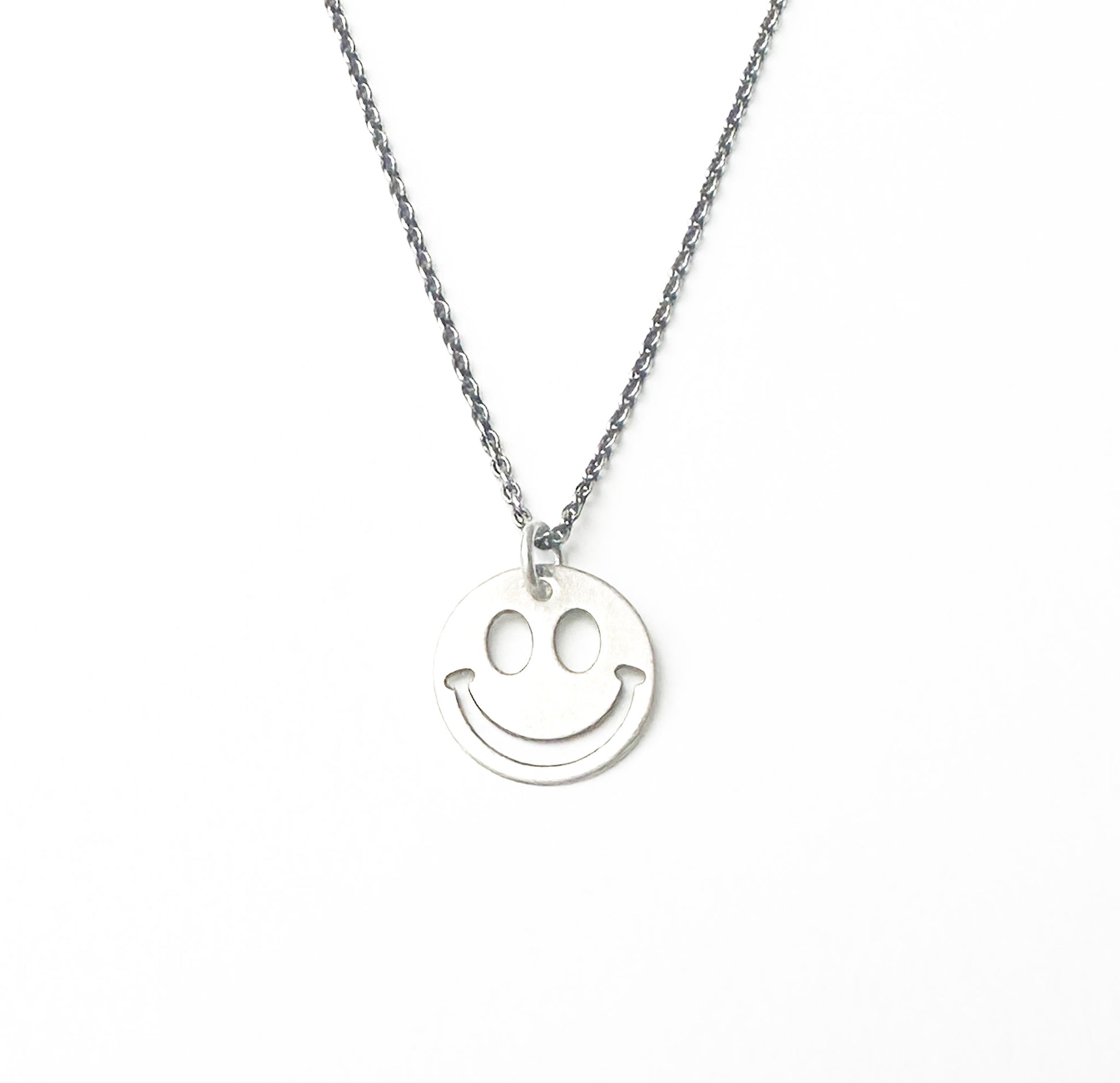 Smiley face necklace 925 silver on white background