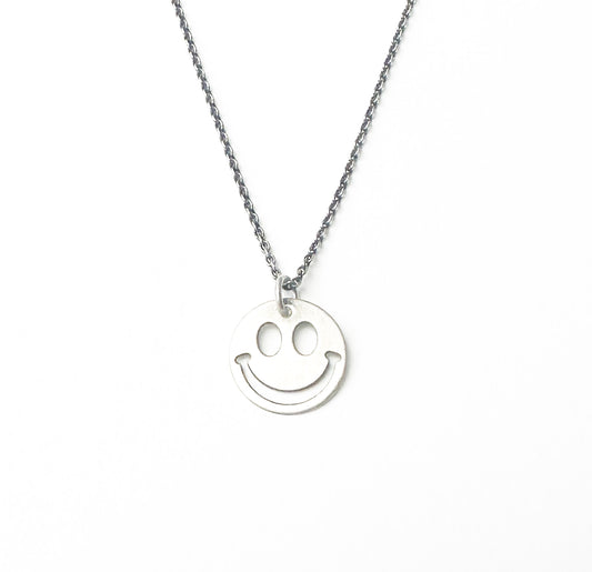Smiley face necklace 925 silver on white background