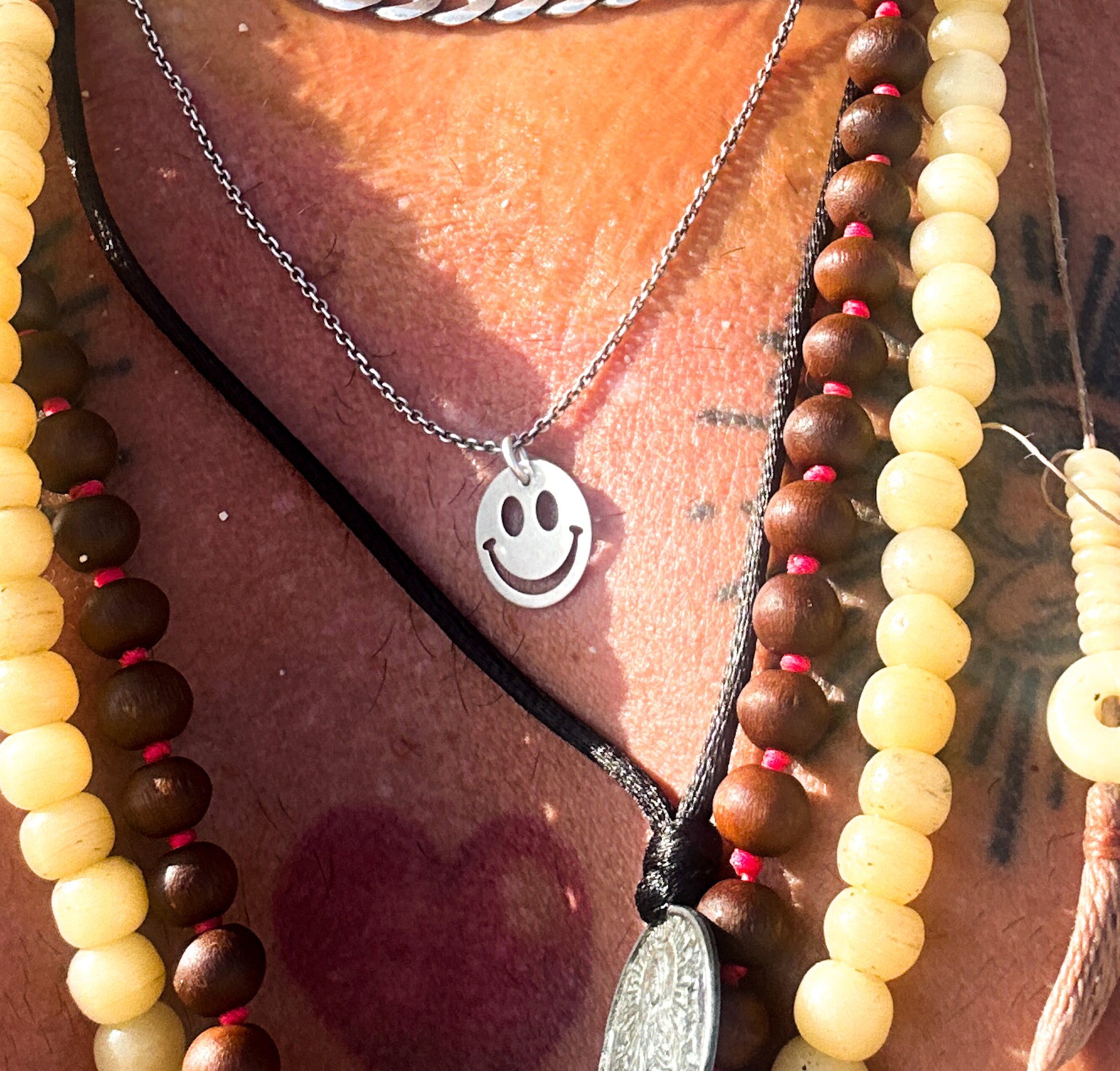 Smiley face necklace silver styled with layered chains