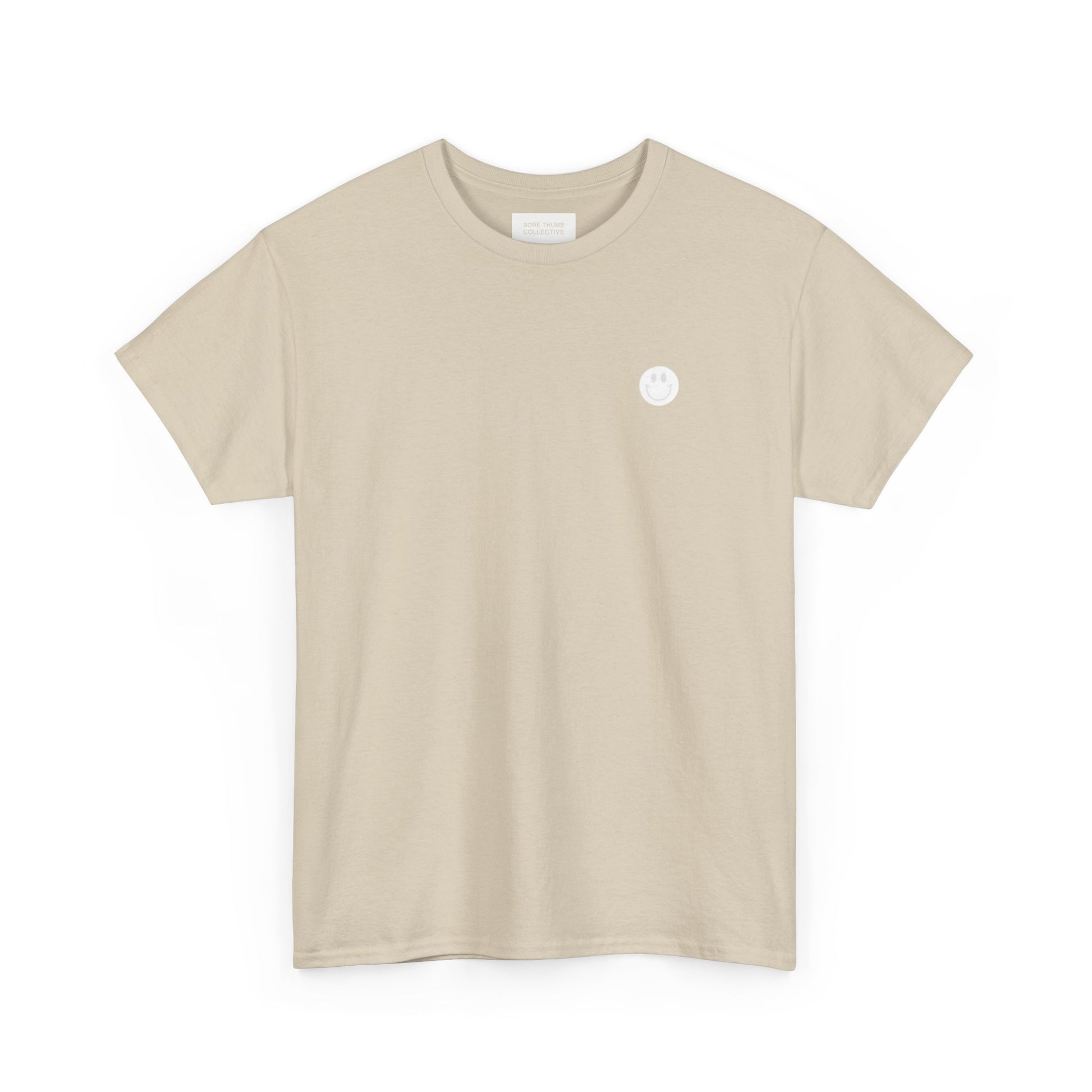 Beige t-shirt with a small white logo on a white background
