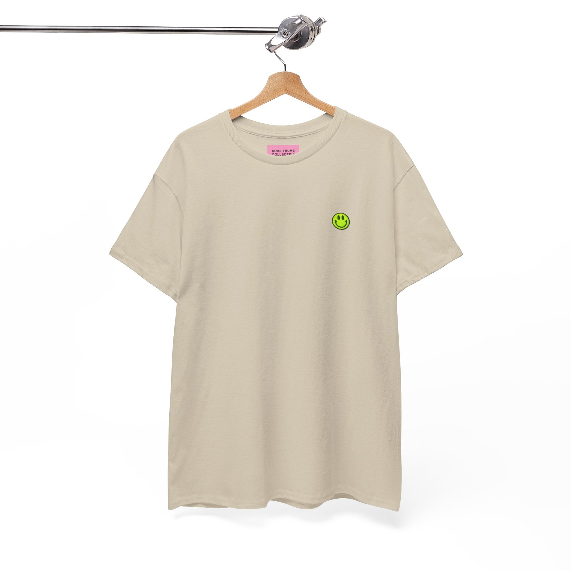 Stone Smiley Face Tee Shirt on Hanger Showing Neon Yellow Embroidery