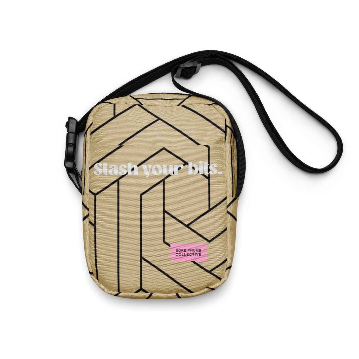 Festival crossbody bag, in beige and black colour, with geometric prints nd front Stash your bits slogan