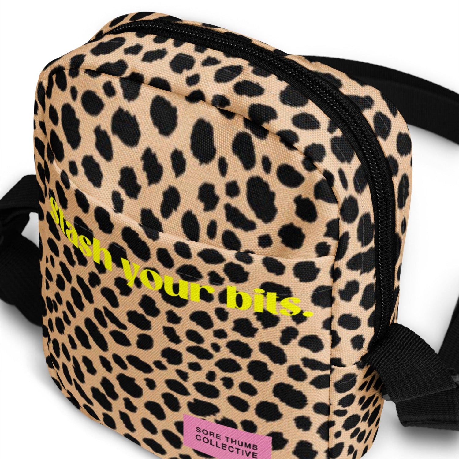 crossbody bag in leopard print, zip closure, front pocket and utility styling, festival crossbody bag