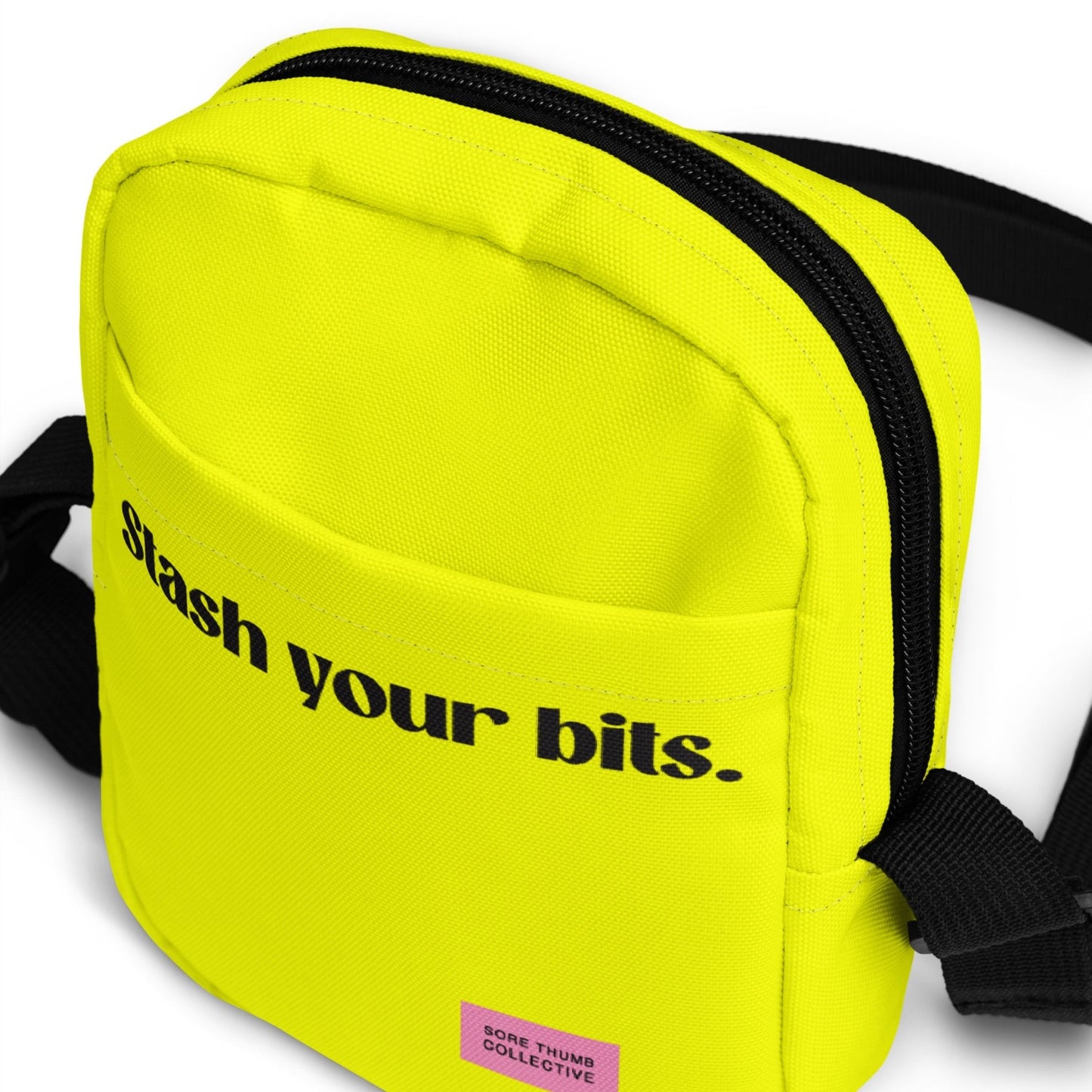 fluorescent crossbody bag, with outside pocket and stash your bits print, fashionable neon yellow cross body bag