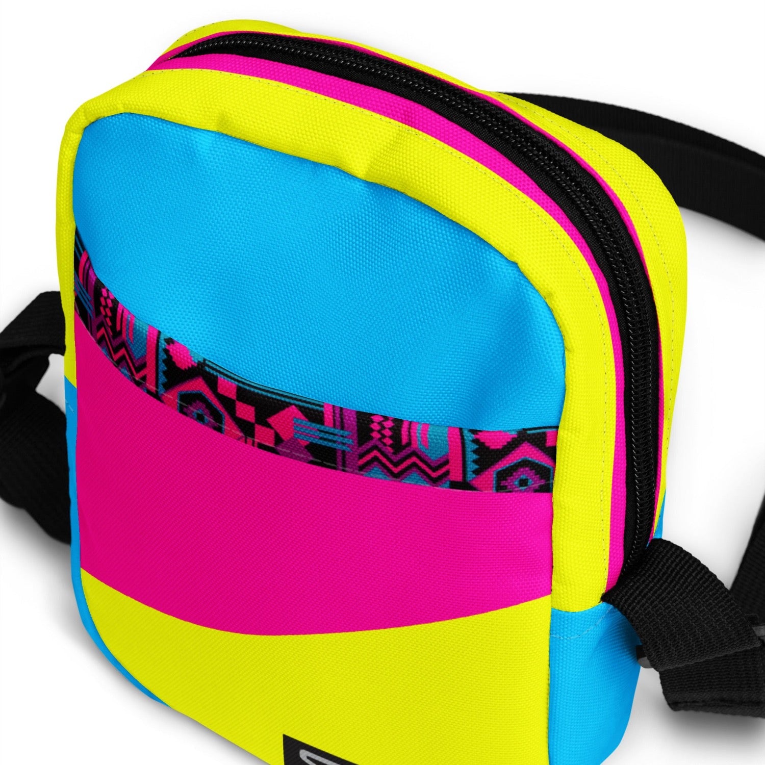 90's inspired neon crossbody bag, yellow, pink, blue and green colours with aztec trim, festival cross body bag.