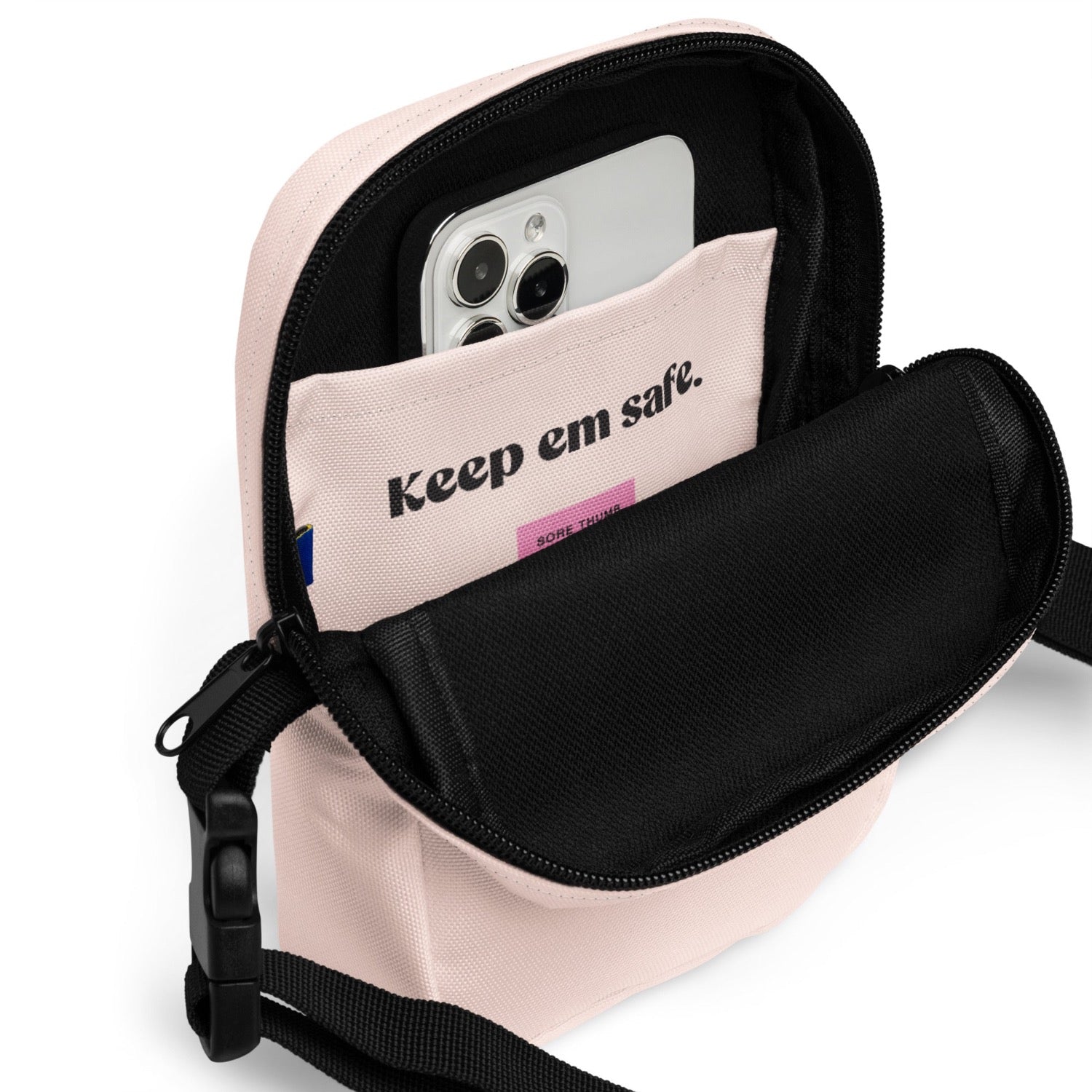 light pink crossbody bag, inside view showing perfect sized pocket for iPhone and festival essentials