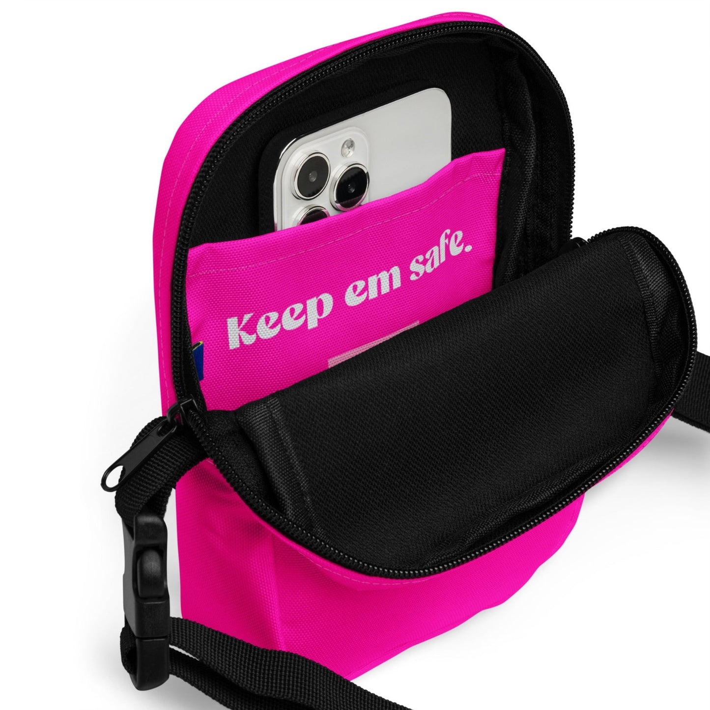 inside view of hot pink crossbody bag. Showing inside pockets and good sized space, rave bum bag