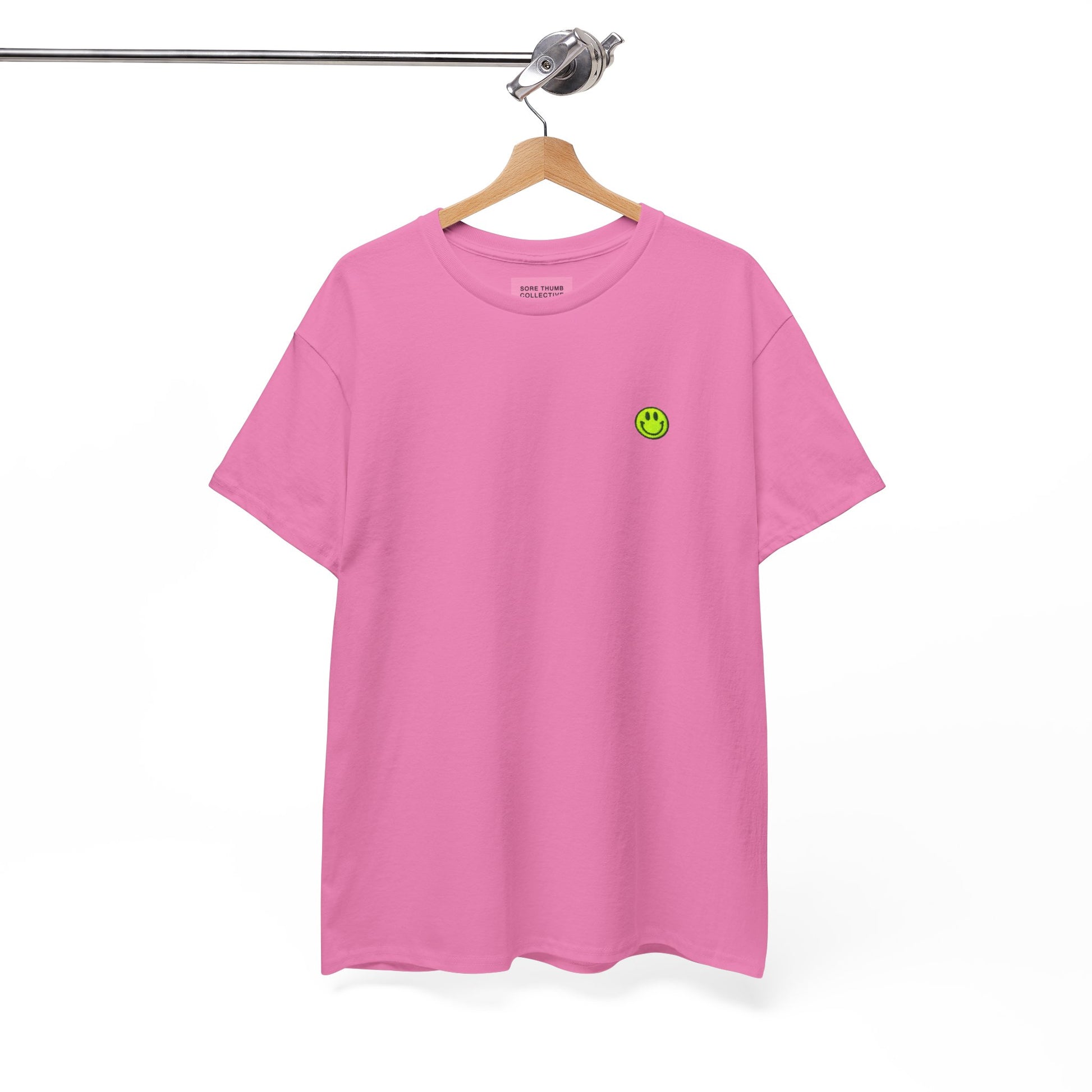 Dusky Pink Smiley Face T Shirt on Hanger with Neon Yellow Embroidery
